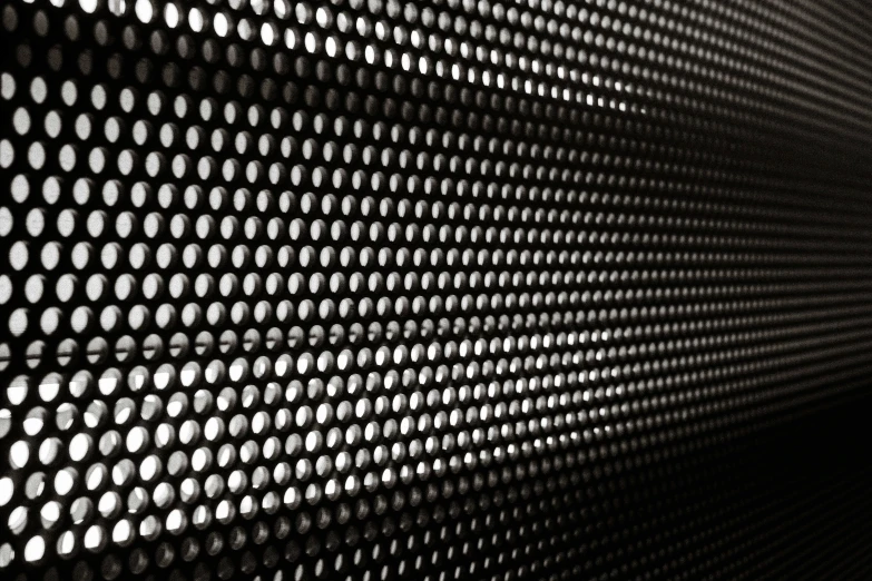 a black and white pograph with many dots on the background