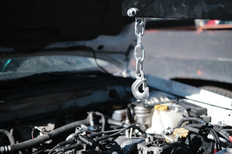 the engine compartment of a truck with some wires