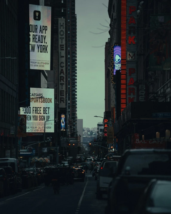 city traffic on a busy city street with advertising signs