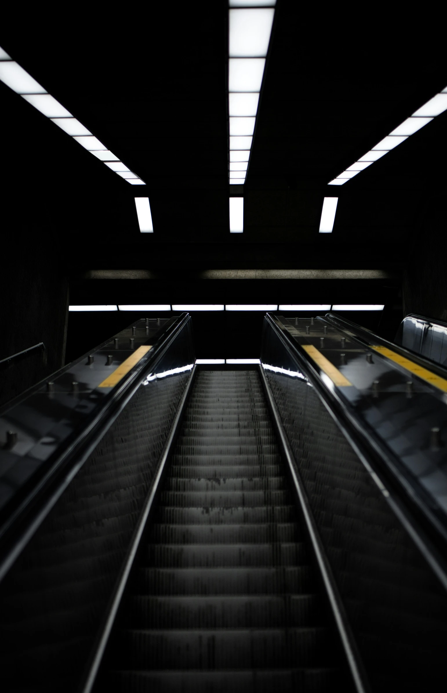 an image of a train platform that is dimly lit