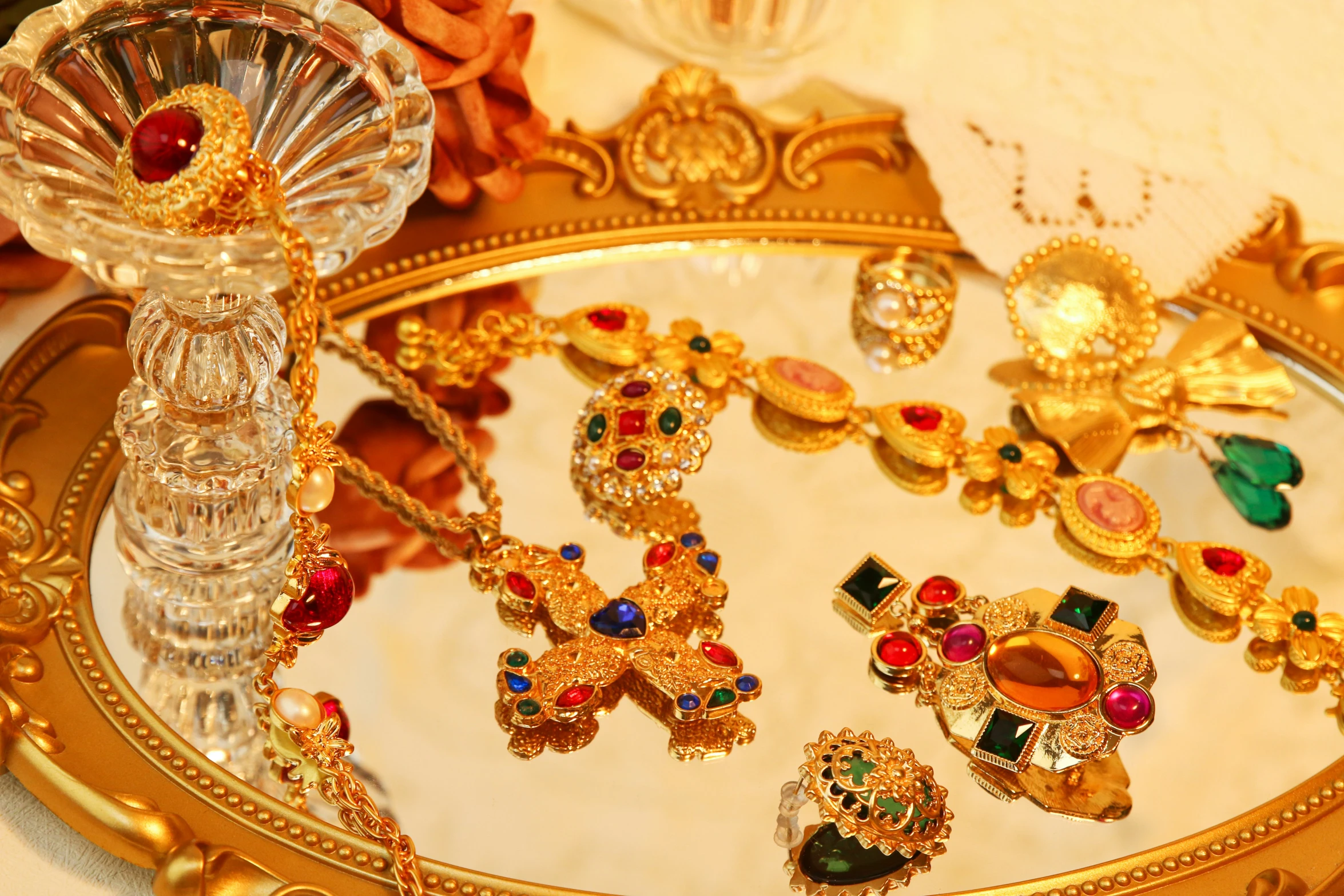 many colorful jewelry sets are in a tray