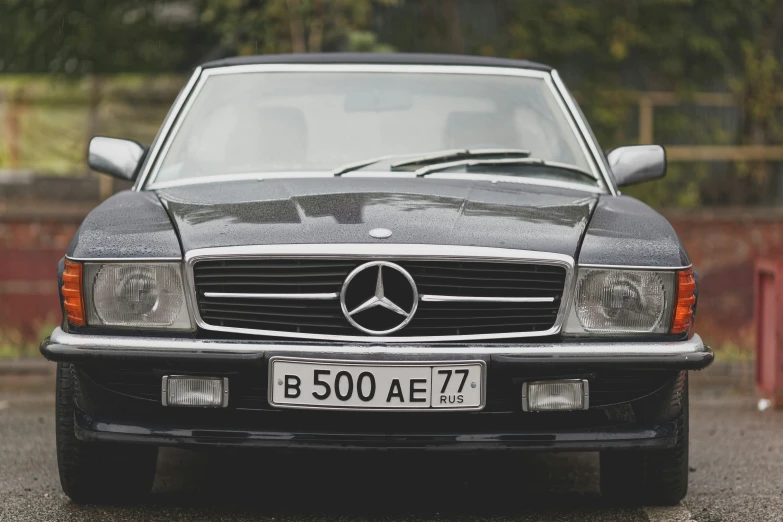 a mercedes benz benz benz benz benz model coupe with large headlights