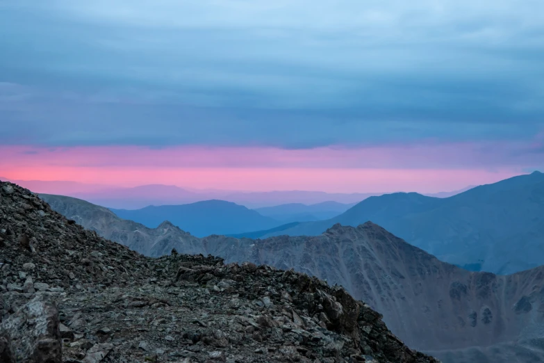 an image of mountains that are covered in snow