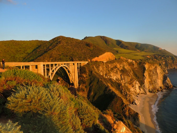 the view from an overlook of a road going over a bridge