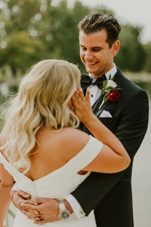 the bride and groom share a moment together at a winery