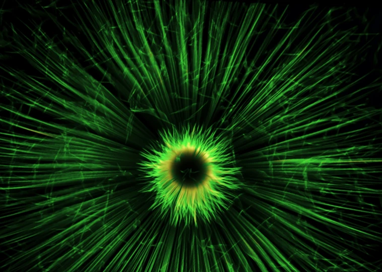 a computer generated green and yellow swirl