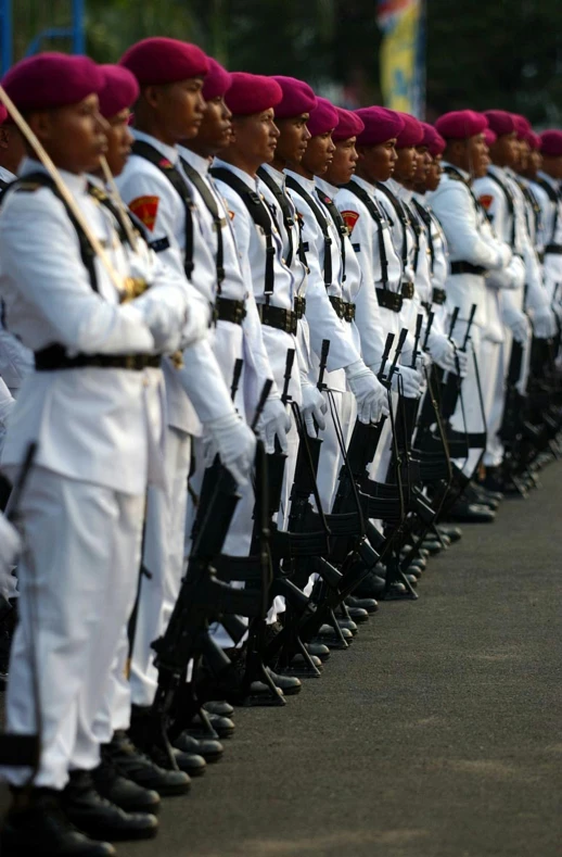 row of soldiers with white uniforms in uniform