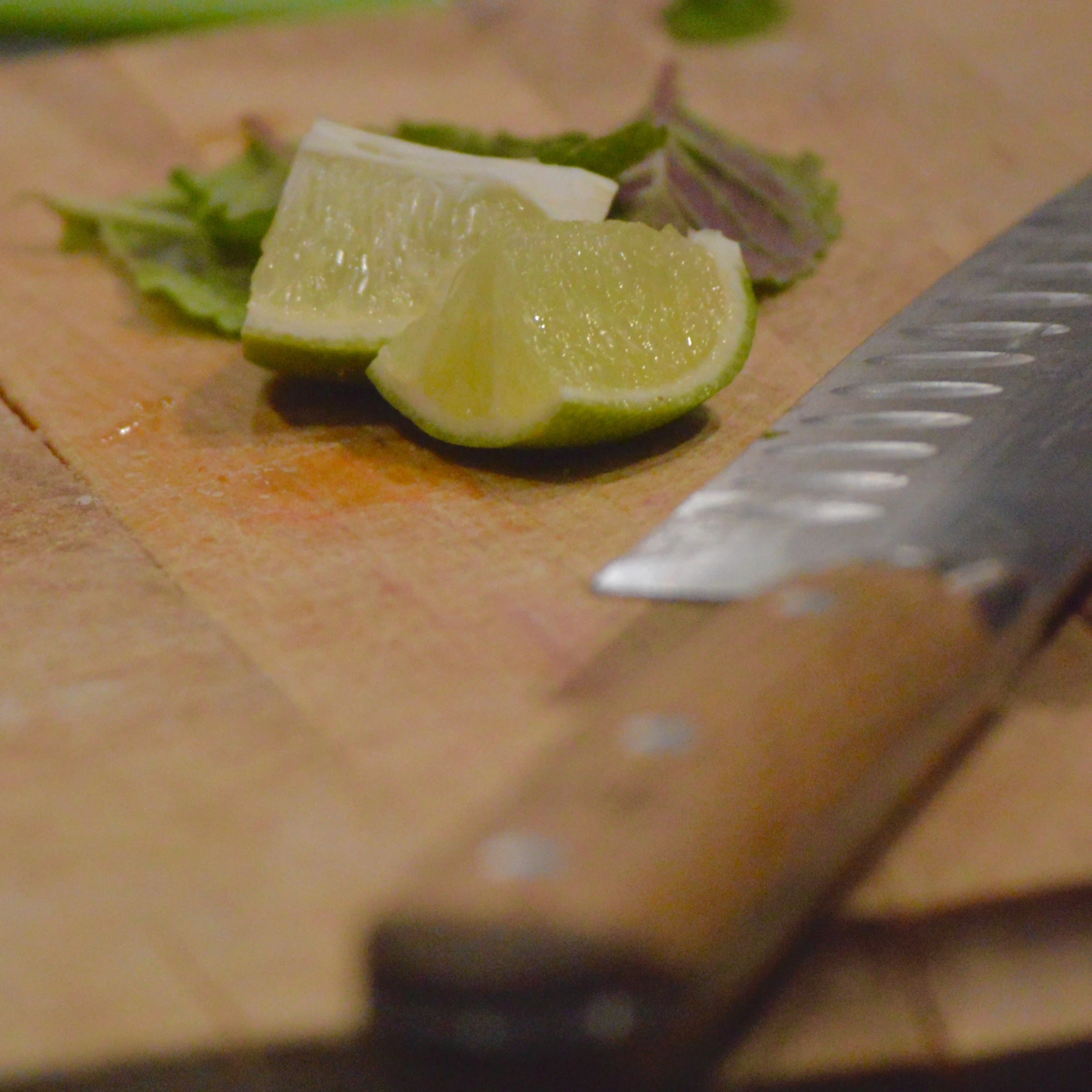 cut up limes and mints on a  board