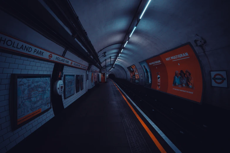 a subway with no passengers is dark and empty