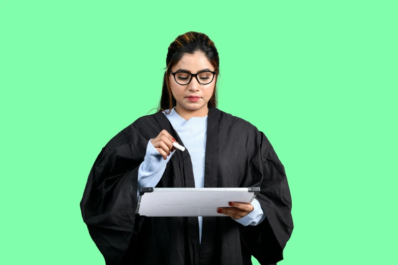 a woman with glasses holding a folder and a pen