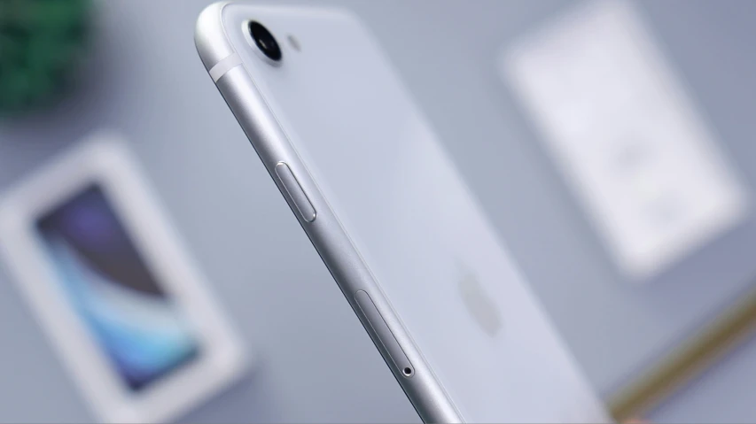 an apple iphone is shown next to other technology