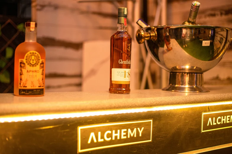 bottles and an ice bucket on a counter