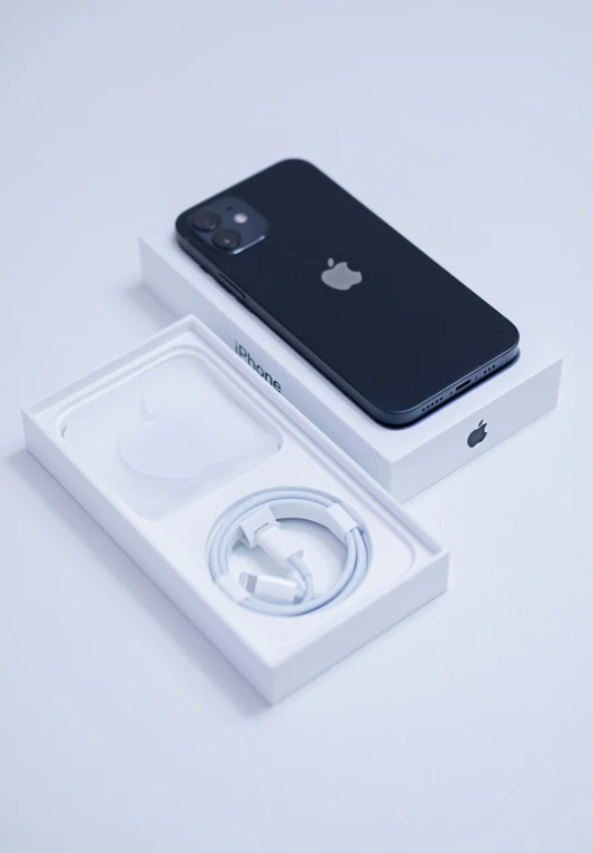 an iphone that is inside of a white box