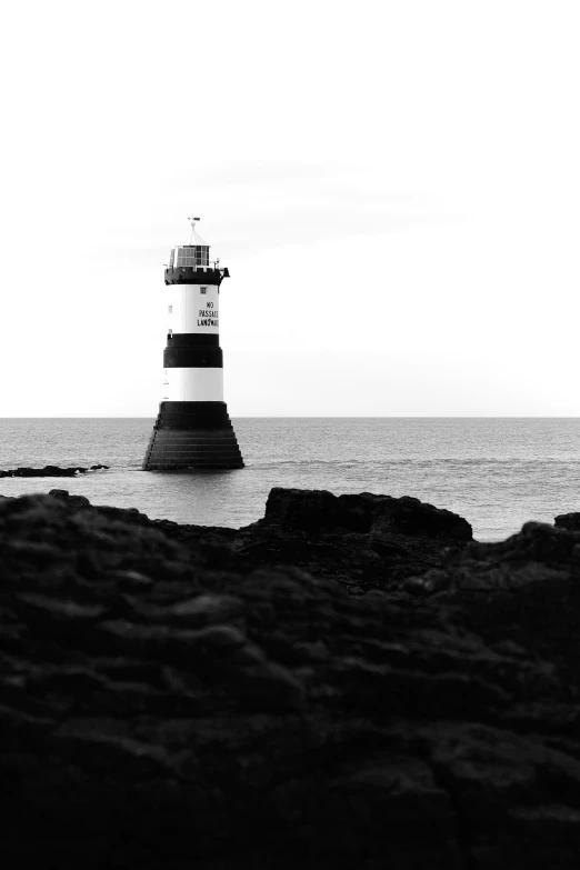 an abstract po of a lighthouse near the ocean