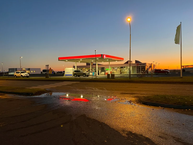 there is a small gas station at the top of the hill