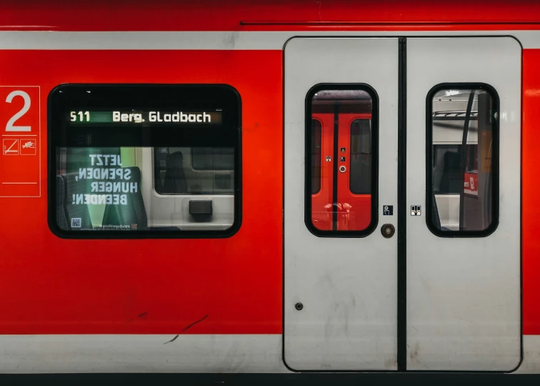 the red and white doors of a subway train