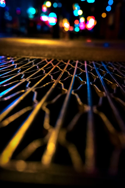 a closeup of an intricate design on the ground at night