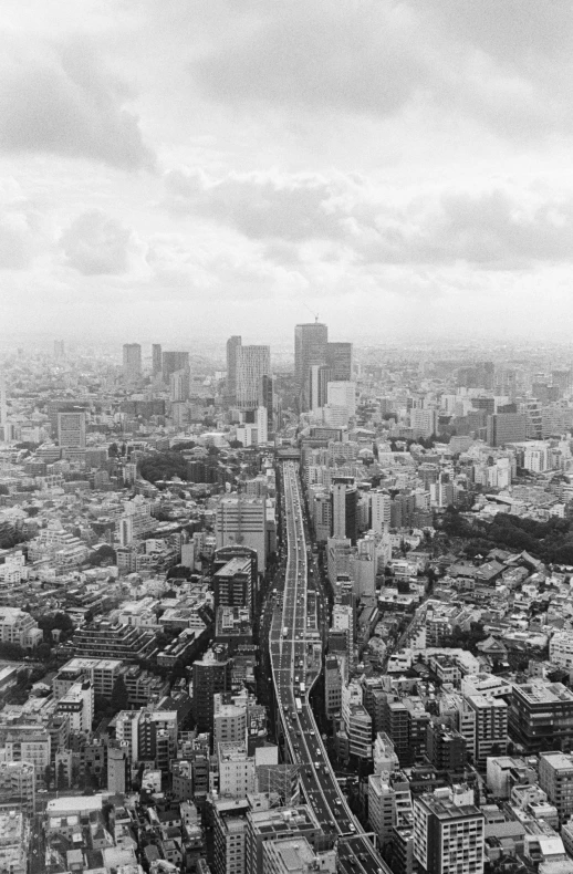 an aerial view of a cityscape with many skyscrs