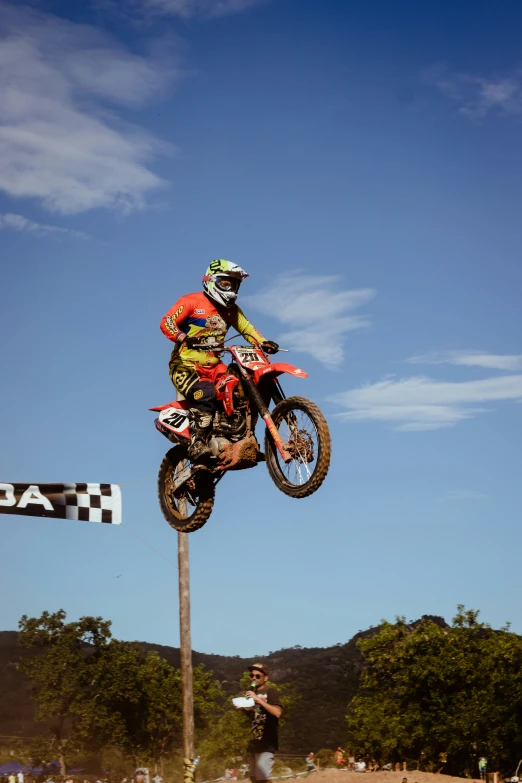 a person riding a dirt bike up in the air