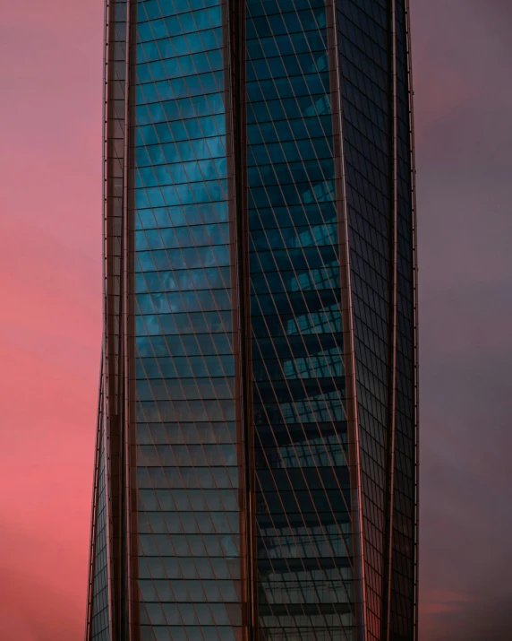 this tall building is made of glass and steel