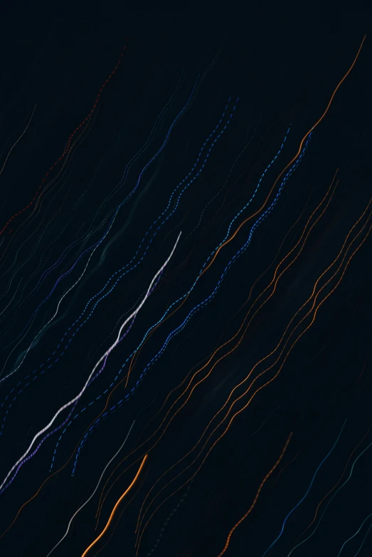 an image of a night sky with light streaks