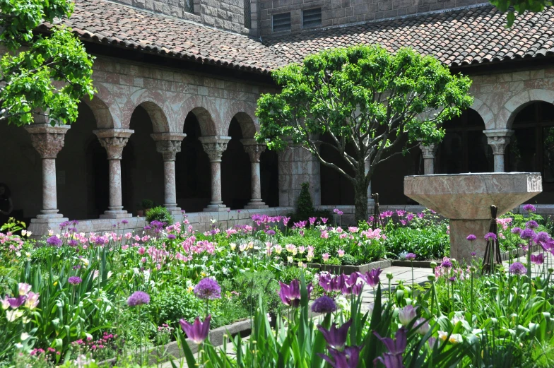 a large building with a water feature in the middle