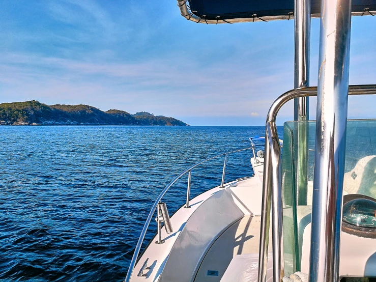 an ocean view looking out at the island from a boat