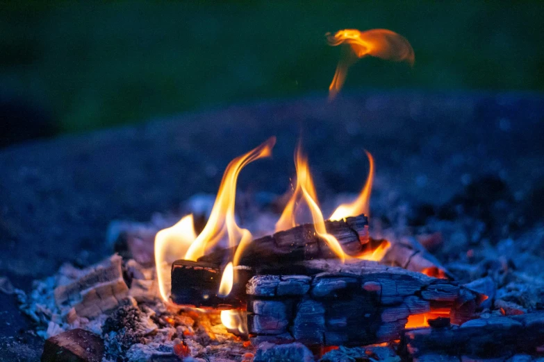 an image of fire blazing in the grill