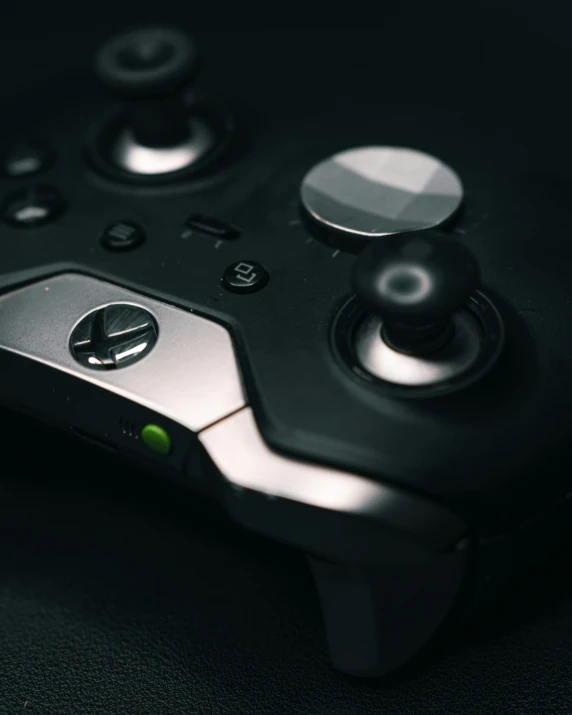 close up of a gaming controller with two ons