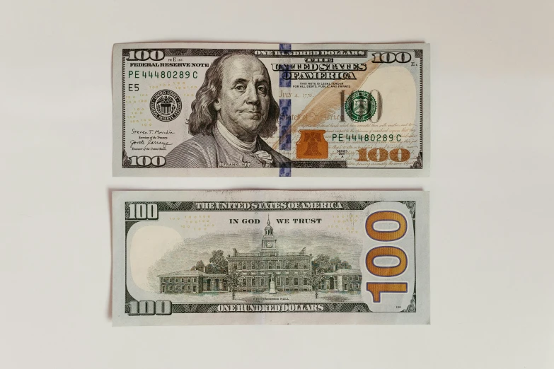two bills with the portrait of aham lincoln