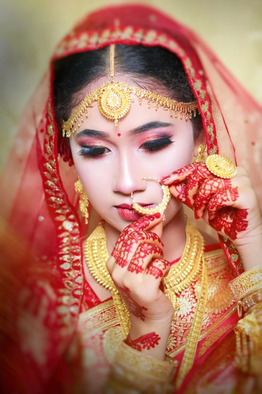 a close up of a person wearing jewelry