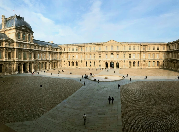 a courtyard with several people in it