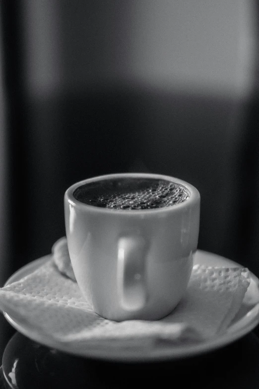 a cup of coffee on top of a saucer