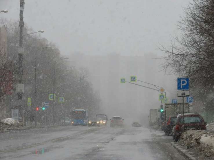 a busy street in winter with all the traffic at the same time