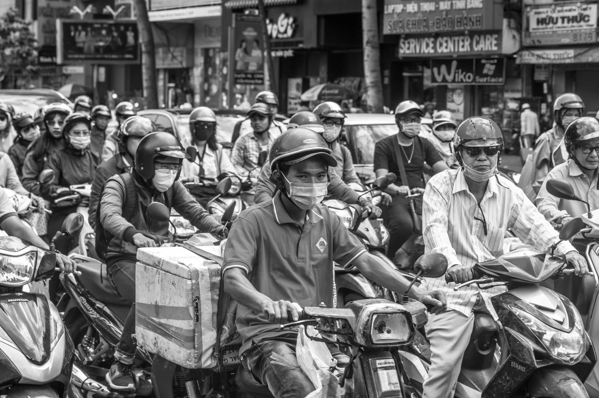 there are a bunch of people riding motorcycles together