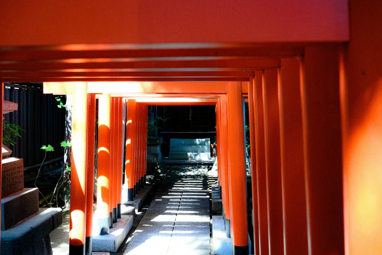 the entrance to a building in japan with a person looking into the building