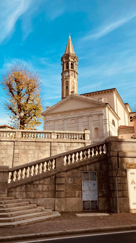 a clock tower above an old brick building