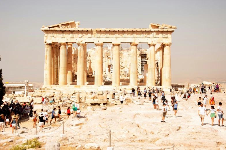 people are standing in front of the ancient temple of bafrae