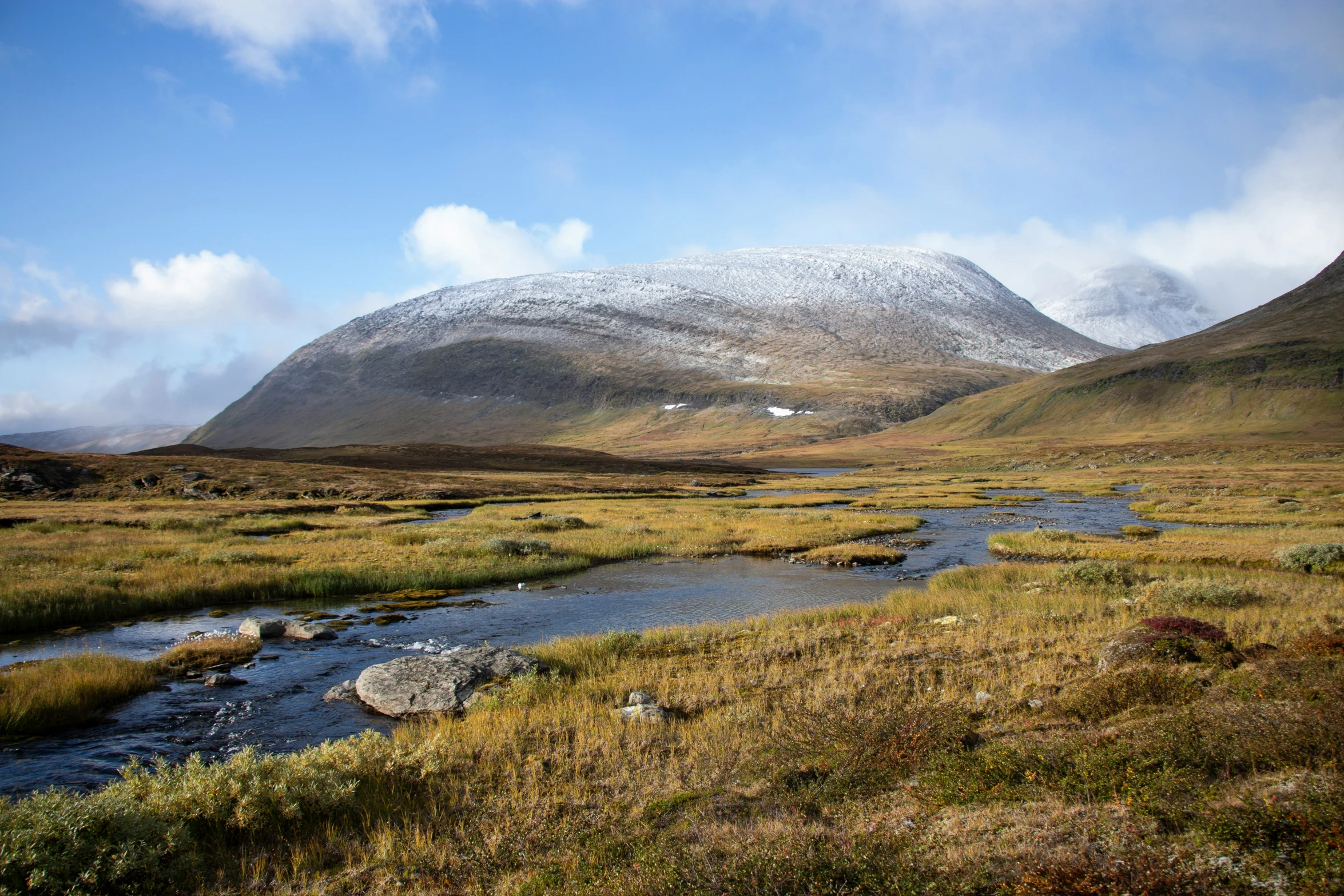 the mountains in the area are covered with snow