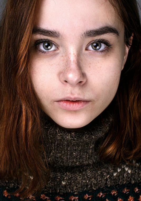 a close up of a person with long hair