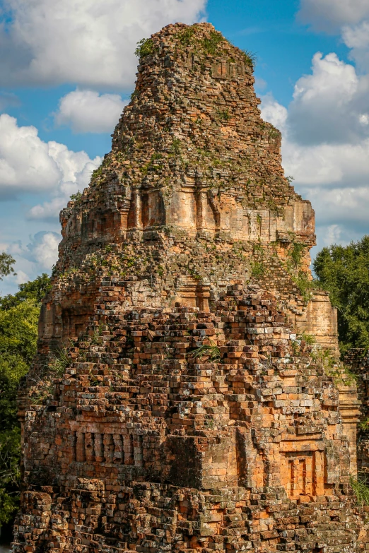 a very tall stone structure with small windows