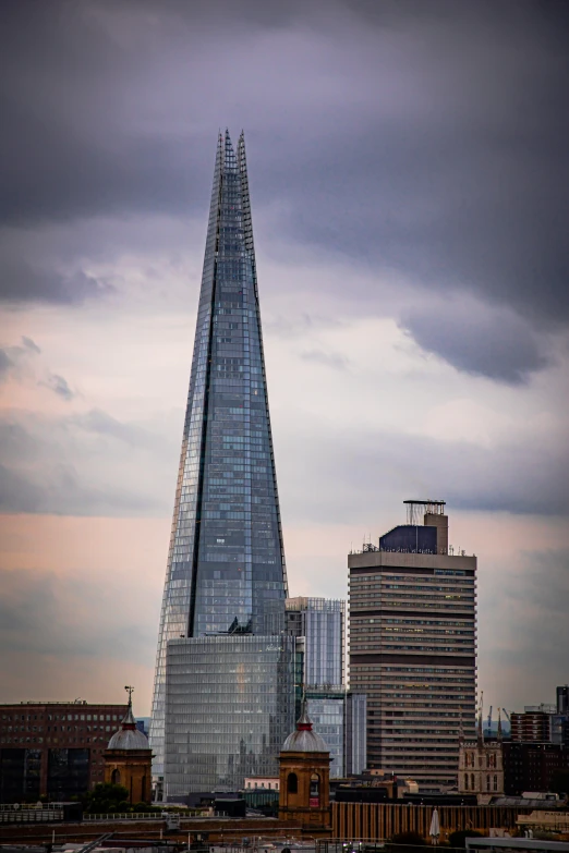 the shard tower rises high into the sky