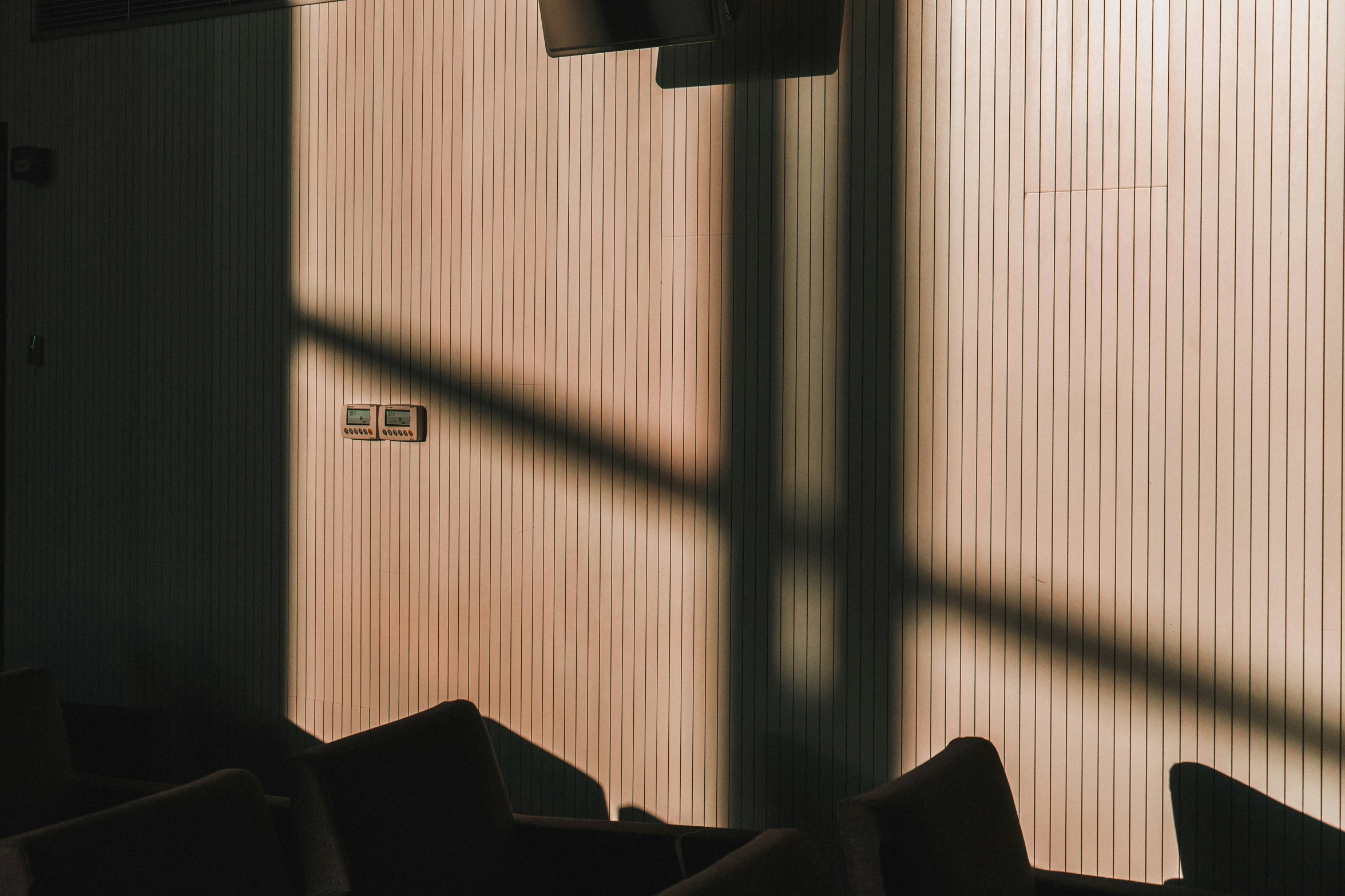 an air vent and wall in an airplane hangar