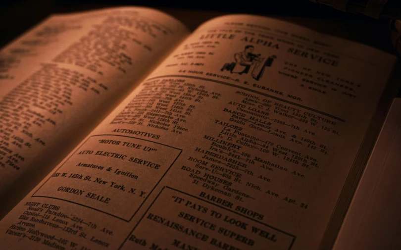 an open book sitting on top of a table