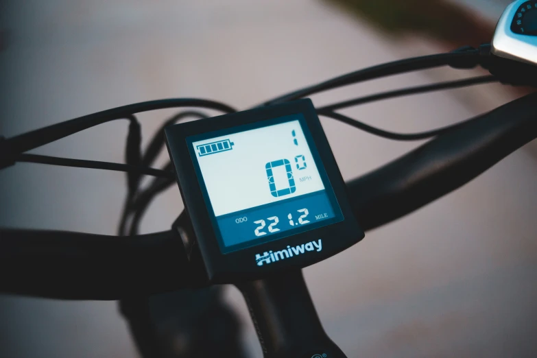 close up of a bike computer displaying speed and numbers