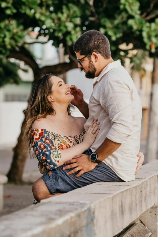 a couple sharing a laugh and looking into each others eyes