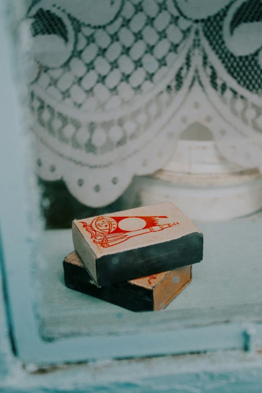 two brown blocks of sugar sitting on a table