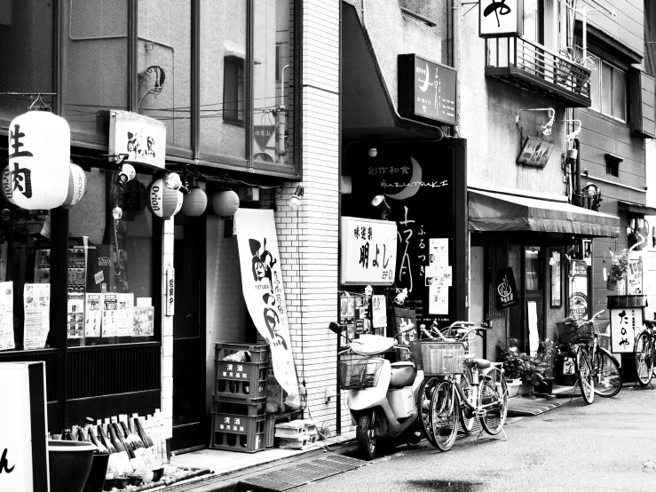 a row of storefronts filled with bicycles