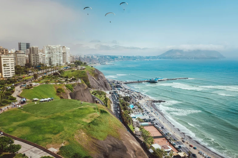 a beautiful view of the sea and beach and mountains