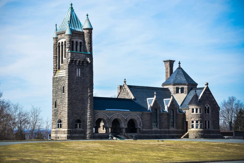 a large stone church with a clock tower